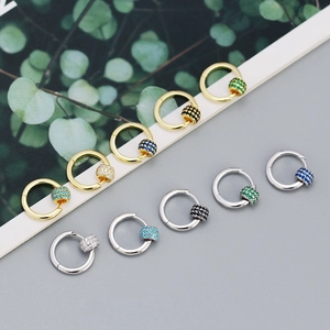 Detailed close-up of s925 silver hoop earrings with moving colorful zircon beads
