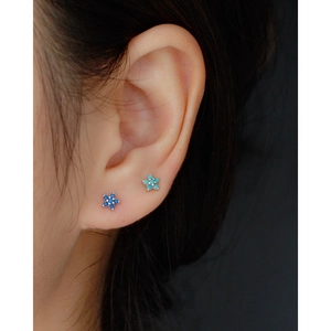 Detailed close-up of S925 silver flower stud earrings with blue and green zircon stones