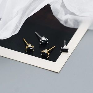 Detail view of S925 silver rectangle black zircon stud earrings in gold and silver finish