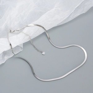 Elegant S925 sterling silver flat snake chain necklace with heart tag on grey background