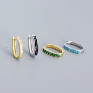 Detailed view of U-shaped earrings with colorful zircons and 17.5mm size markings