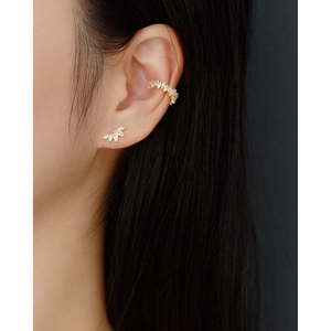 Detailed view of gold S925 silver stud earrings with marquise zircon stones and crown design