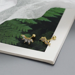 Detailed view of s925 gold screw back studs with marquise-cut zircon crown leaf design