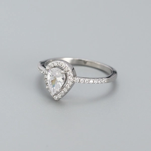 Elegant S925 sterling silver ring featuring a large pear-cut zircon in a luxury halo setting