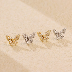 Elegant butterfly stud earrings in gold and silver finish with sparkling marquise zirconia