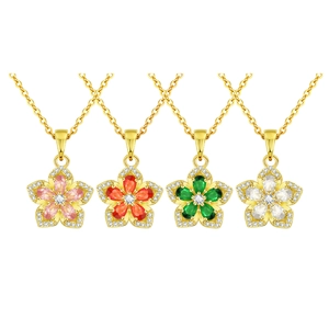 Rotating floral pendant necklace with colorful cubic zirconia and gold plated chain
