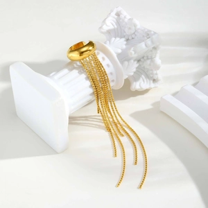 Elegant gold-plated stainless steel ear cuff with long tassel chains on a white column