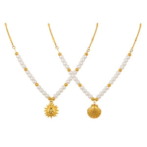 Marine style stainless steel necklace with sun and shell charms and lustrous pearls