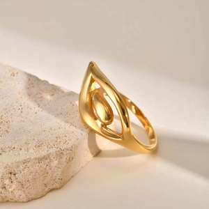 Exquisite 18K gold stainless steel openwork wing ring on textured white mineral stone