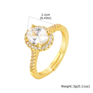 Detail of adjustable gold ring with oval green zircon and micro-pave crystals