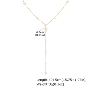 Detail view of gold Y-shaped pearl necklace with daisy pendant dimensions and chain length