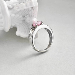 Elegant stainless steel ring with oval pink zircon and vintage engraved texture