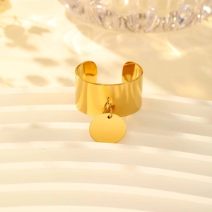 Detail of gold-plated stainless steel wide open ring with a smooth round coin pendant