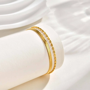 Double-layered golden stainless steel bracelet with flat snake chain and bamboo bead design