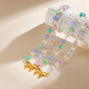 Collier en acier inoxydable pour femmes avec perles dégradées et pendentif nœud doré