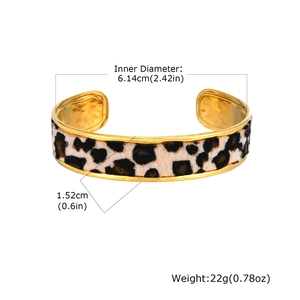 Detail view of leopard print cuff bracelet with 6.14cm inner diameter and 1.52cm width