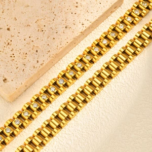 Gold stainless steel watch-link bracelet with sparkling cubic zirconia crystals inlay