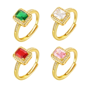 Adjustable gold plated rings set with rectangular emerald, ruby, and pink zircon stones