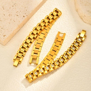 Detailed close-up of four gold-plated stainless steel chains and zircon bracelet designs