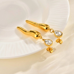 Gold stainless steel drop earrings with teardrop zirconia in a geometric flare design