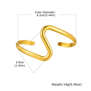 Detail view of the gold double-layer geometric open bangle with size measurements