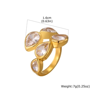 Elegant gold-tone ring featuring five pear-cut cubic zirconia stones on a wide band