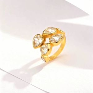 Elegant gold-plated stainless steel ring featuring multiple pear-shaped zircon stones