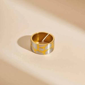 Minimalist bicolor stainless steel open ring with irregular gold and silver patterns