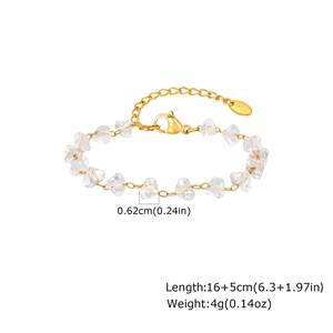 Detail view of gold stainless steel bracelet with irregular transparent beads and K18 tag