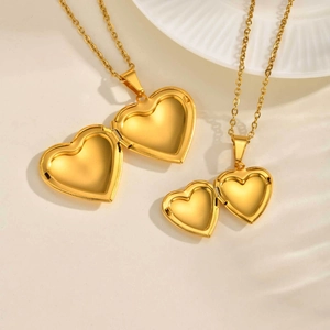 Golden heart locket pendant necklace in stainless steel with open photo frame design