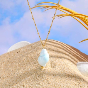 Nautical stainless steel necklace with gradient blue seashell pendant and gold beads