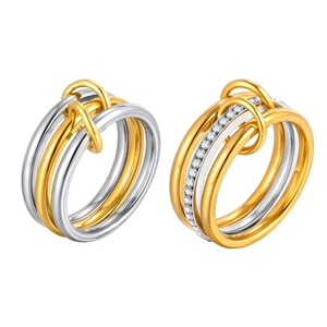 Two-tone multi-band interlocking stainless steel rings with sparkling cubic zirconia pavé