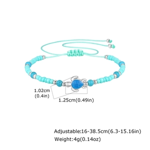 Detail view of turquoise turtle anklet showing adjustable cord size and pendant dimensions