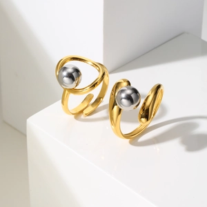 Modern gold irregular wave ring with silver metal bead, minimalist open design for women