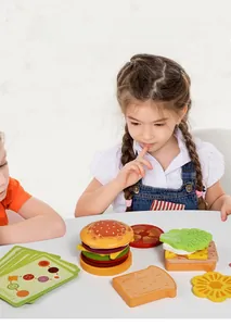 Detail of wooden play food hamburger set with assembly parts and recipe cards