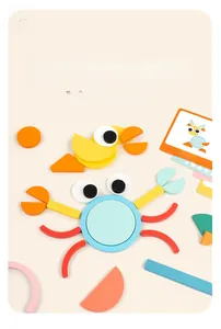 Educational geometric building blocks showing crab and duck shapes with guide cards