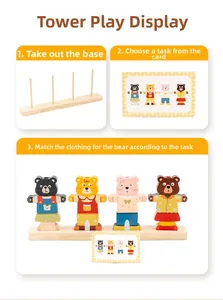 Detailed view of the wooden bear dress-up puzzle showing step-by-step game guide and base