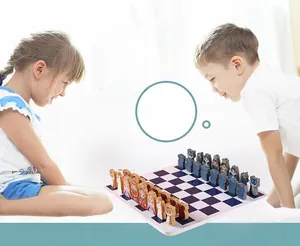 Close-up of kids playing with wooden cartoon chess and purple checkered game board