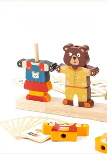 Close-up of a sturdy solid wood base and colorful bear dress-up puzzle modules