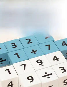 Close-up of wooden math blocks with high-quality printed numbers for early learning