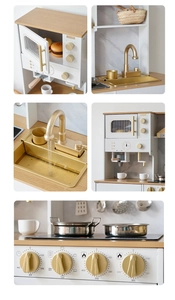 Macro details of white wooden play kitchen with golden faucet, knobs and toy stove
