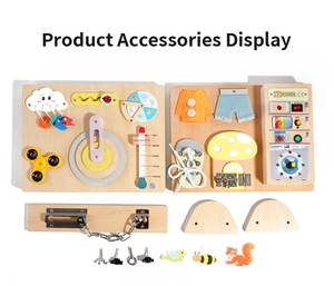 Detail view of Montessori wooden busy board with switches, locks, and sensory buttons