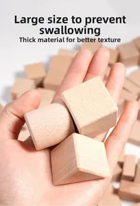 Close-up of large solid beech wood building blocks showing smooth texture and safe size