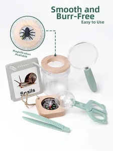 Detailed view of wooden insect observation kit including magnifier, tweezers and compass