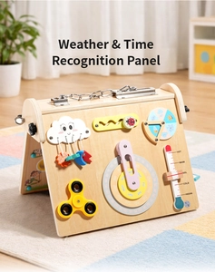 Detail of wooden busy board showing calendar, weather dials and fidget spinner for kids