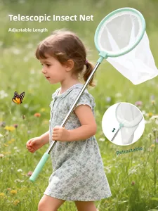 Girl holding mint green retractable butterfly net for outdoor insect catching fun
