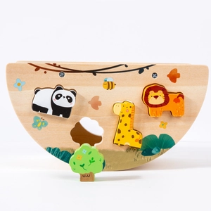 Montessori wooden balance puzzle toy with animal blocks on a natural semicircular base