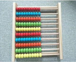 Top view of a colorful 10-row wooden abacus for early childhood math learning