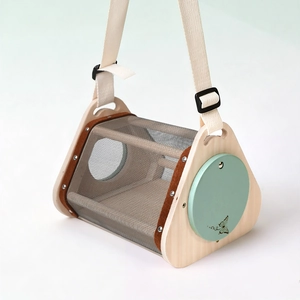 Wooden insect observation box with green door and adjustable strap for outdoor nature exploration