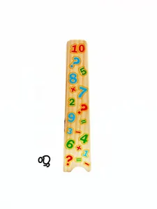 Close-up of wooden blocks with colorful numbers and math symbols for early learning